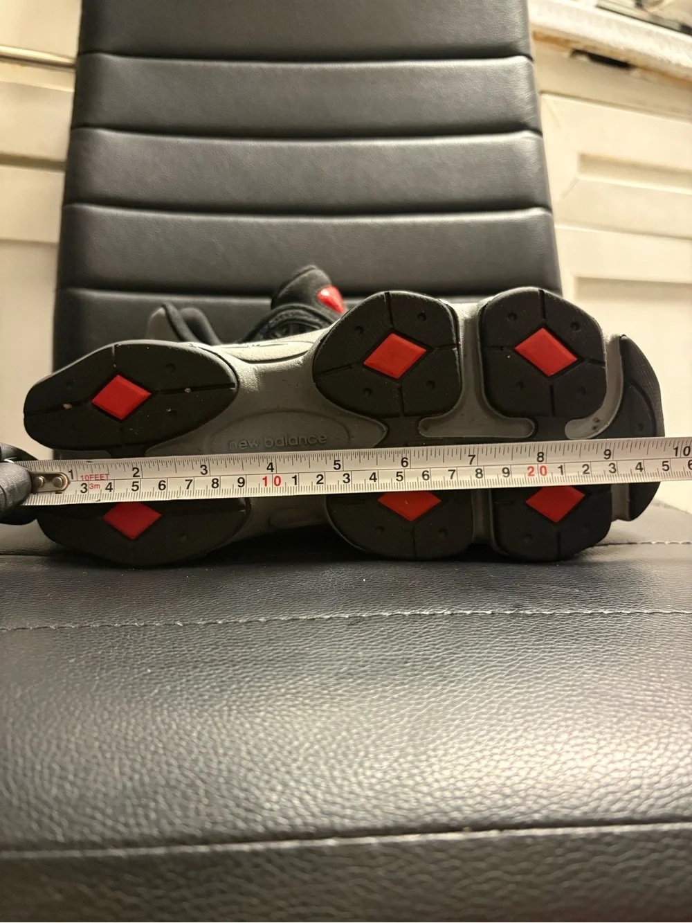 New Balance Kids Black and Gray Athletic Sneakers with Red Logo Accent